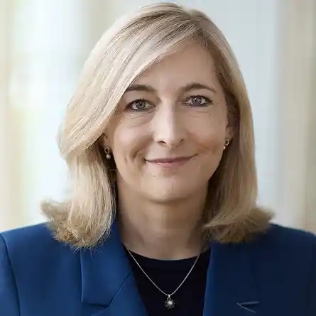Nina Warken, portrait in a navy blazer